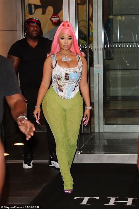 Nicki Minaj Rocks Fishnet Stockings & Bright Yellow Hair For .